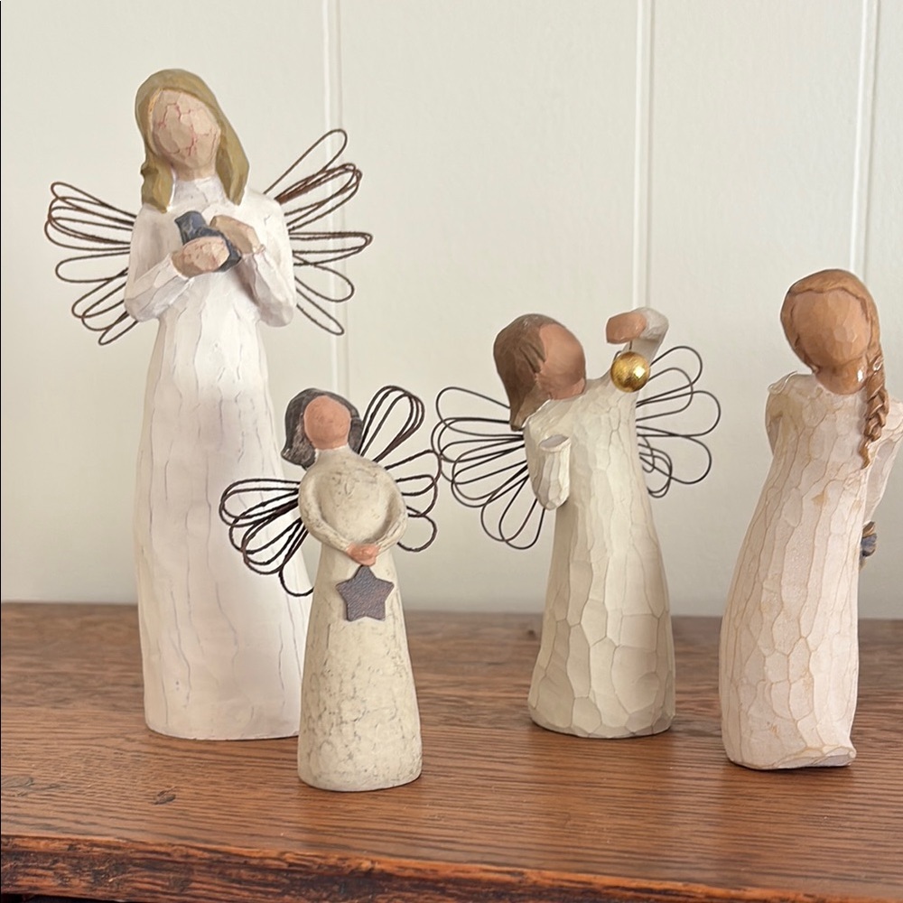 Willow Tree figurines 4 in all.